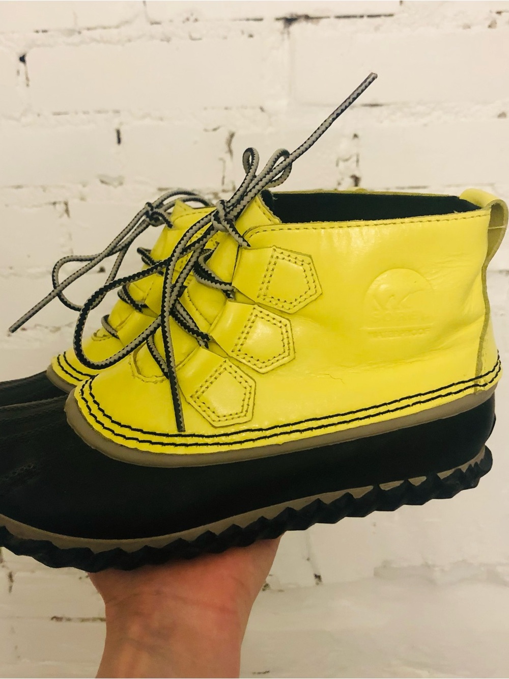 SOREL women’s Yellow & Black Lace-Up Duck Boots